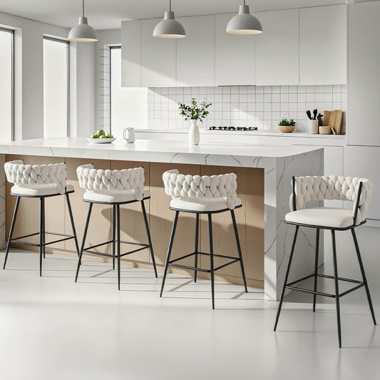 Modern kitchen with white bar stools and a clean design.