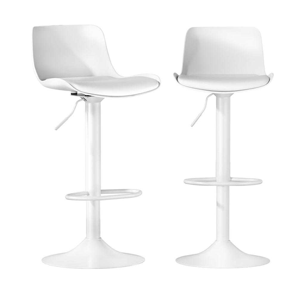 A pair of modern white bar stools with padded seats and chrome bases.