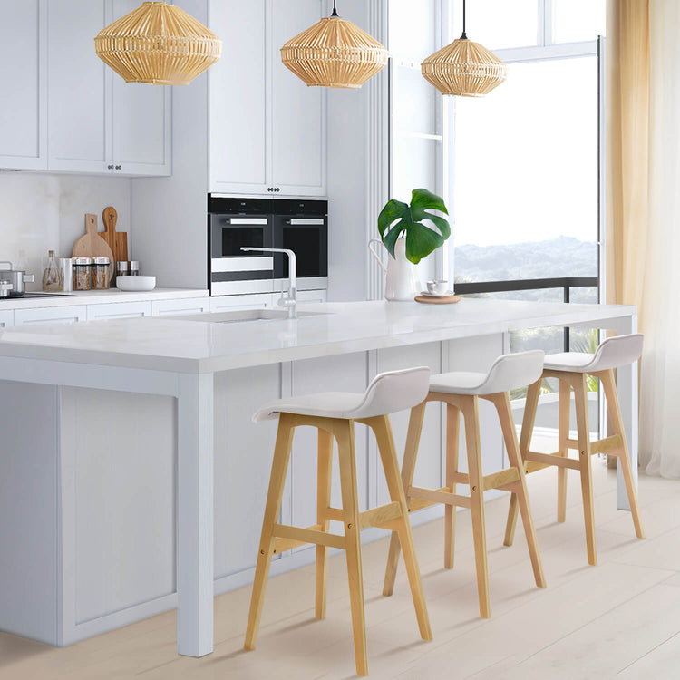 Kitchen island with timber bar stools for modern kitchens