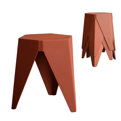Two terracotta-colored stools with geometric designs on a white background