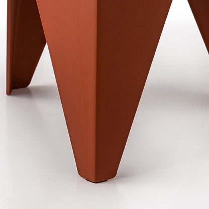 Close-up of a terracotta-colored chair leg on a white background