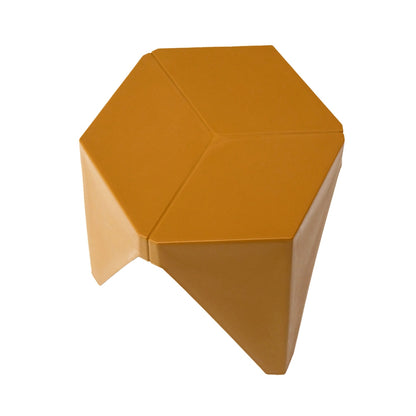 Hexagonal mustard yellow stool on a white background