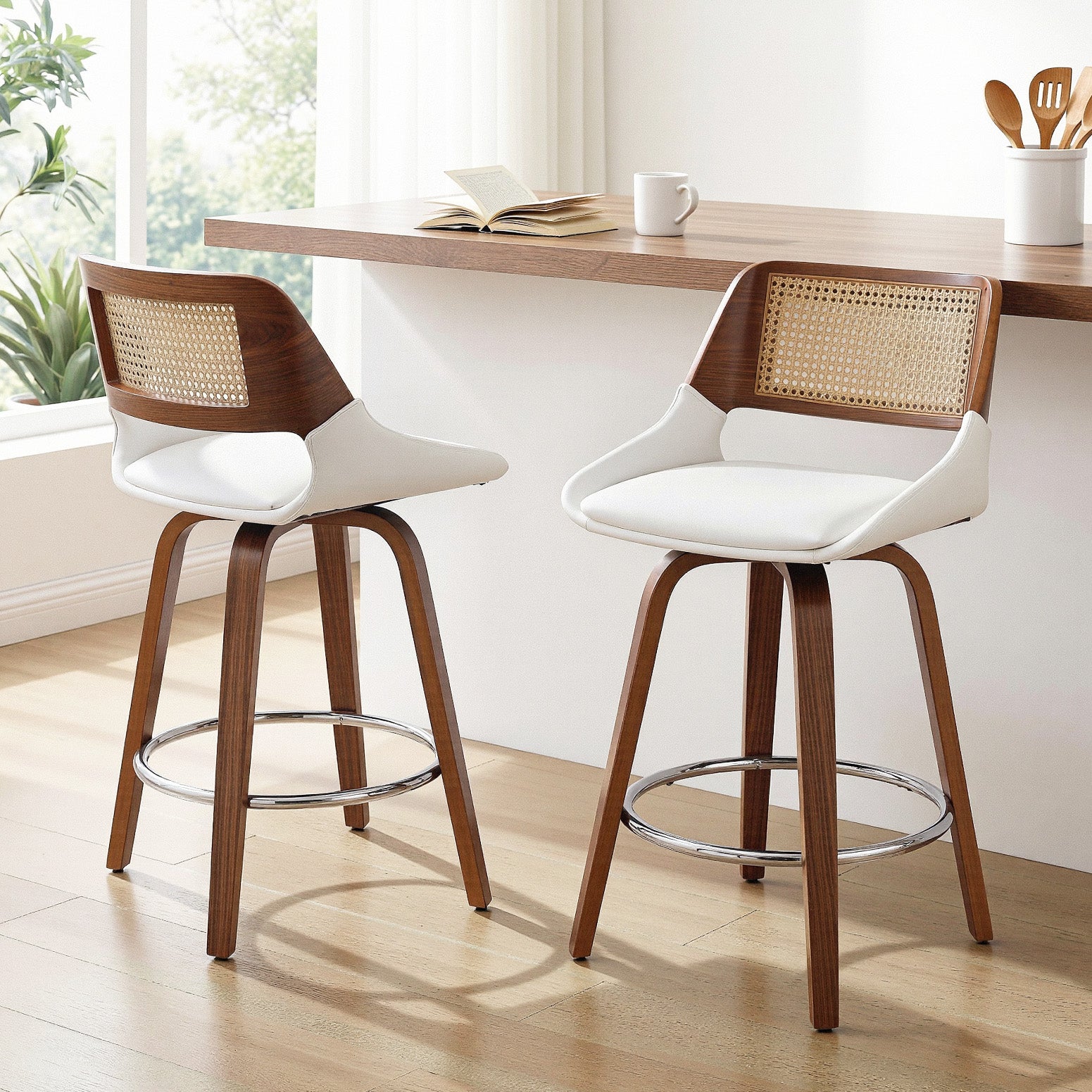 Two bar stools with wooden frames and white seats in a kitchen setting.