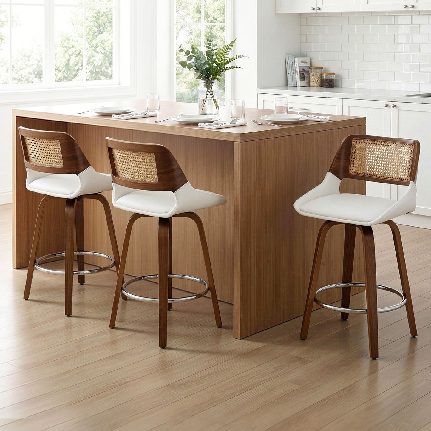 Wooden kitchen island with three bar stools in a bright kitchen setting