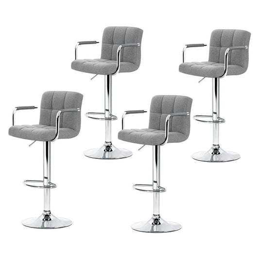 Four gray bar stools with chrome bases on a white background