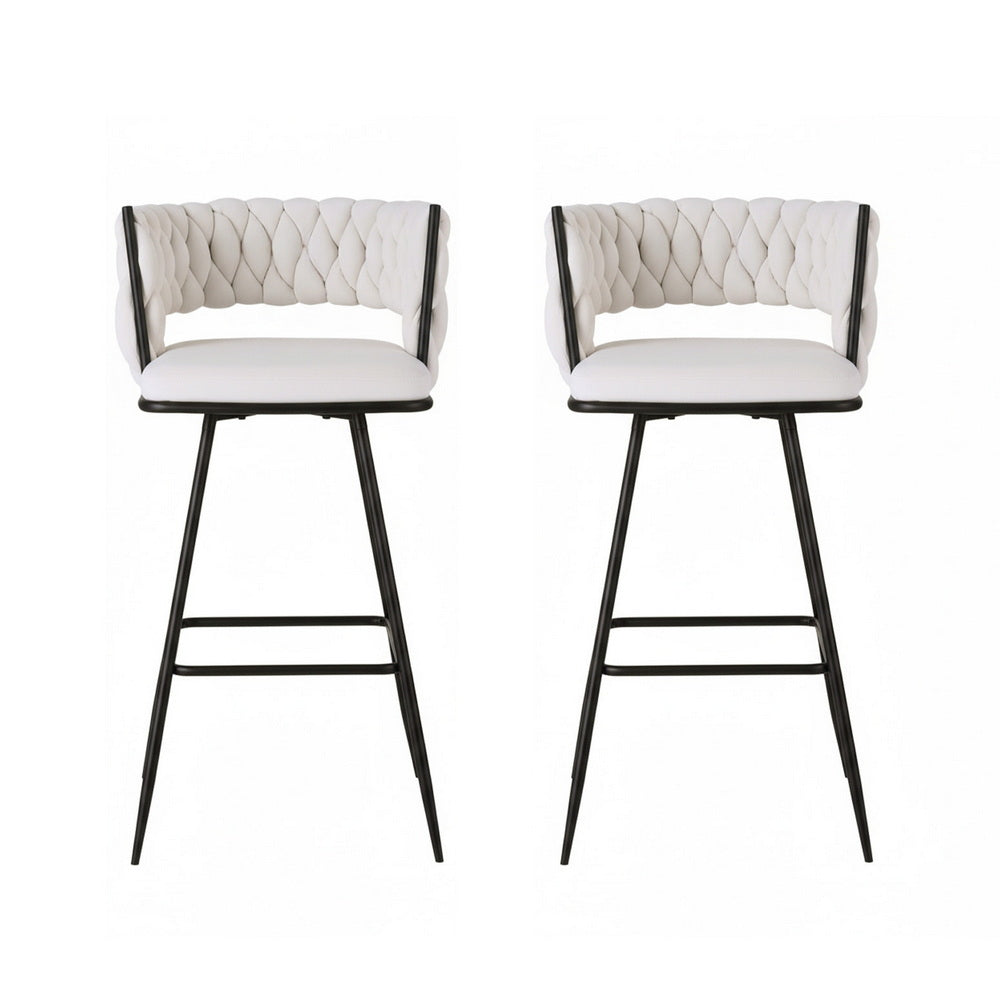 Two white bar stools with quilted backrests on a white background