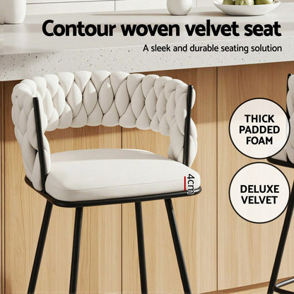 White contour woven velvet chair with black legs on a wooden floor, featuring text about the product's features.