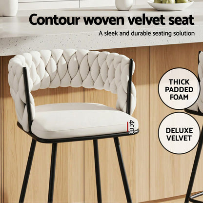 White contour woven velvet chair with black legs on a wooden floor, featuring text about the product's features.