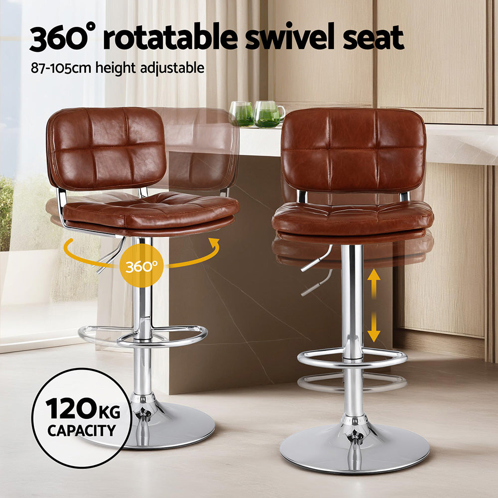 Two brown bar stools with a 360-degree swivel seat and height adjustment feature in a kitchen setting.