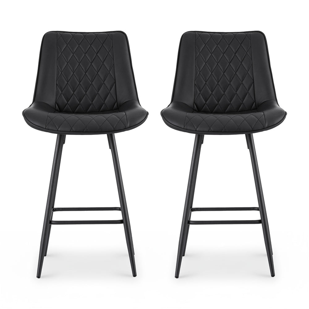 Two black bar stools with quilted seats on a white background