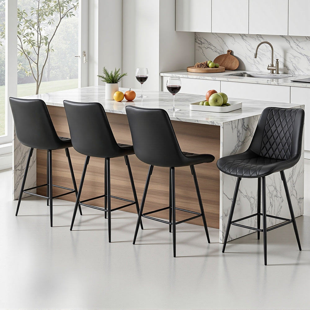 Modern kitchen with marble island and black bar stools