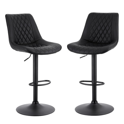 Two black quilted bar stools on a white background