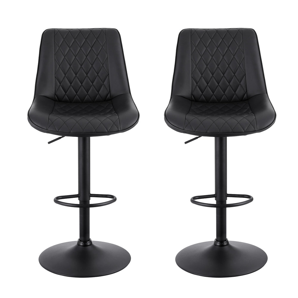 Two black bar stools with quilted seats on a white background