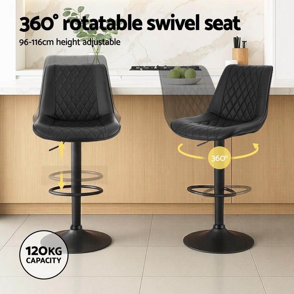 Two black bar stools with 360-degree swivel seat feature in a kitchen setting.