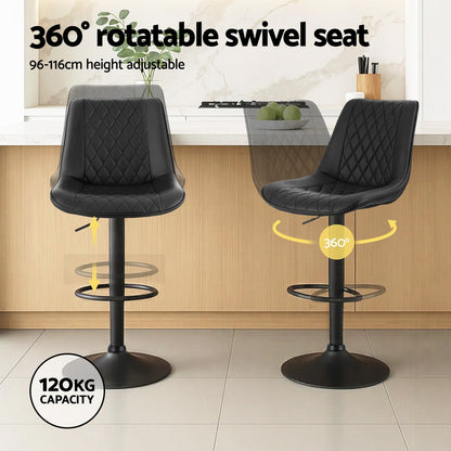 Two black bar stools with 360-degree swivel seat feature in a kitchen setting.
