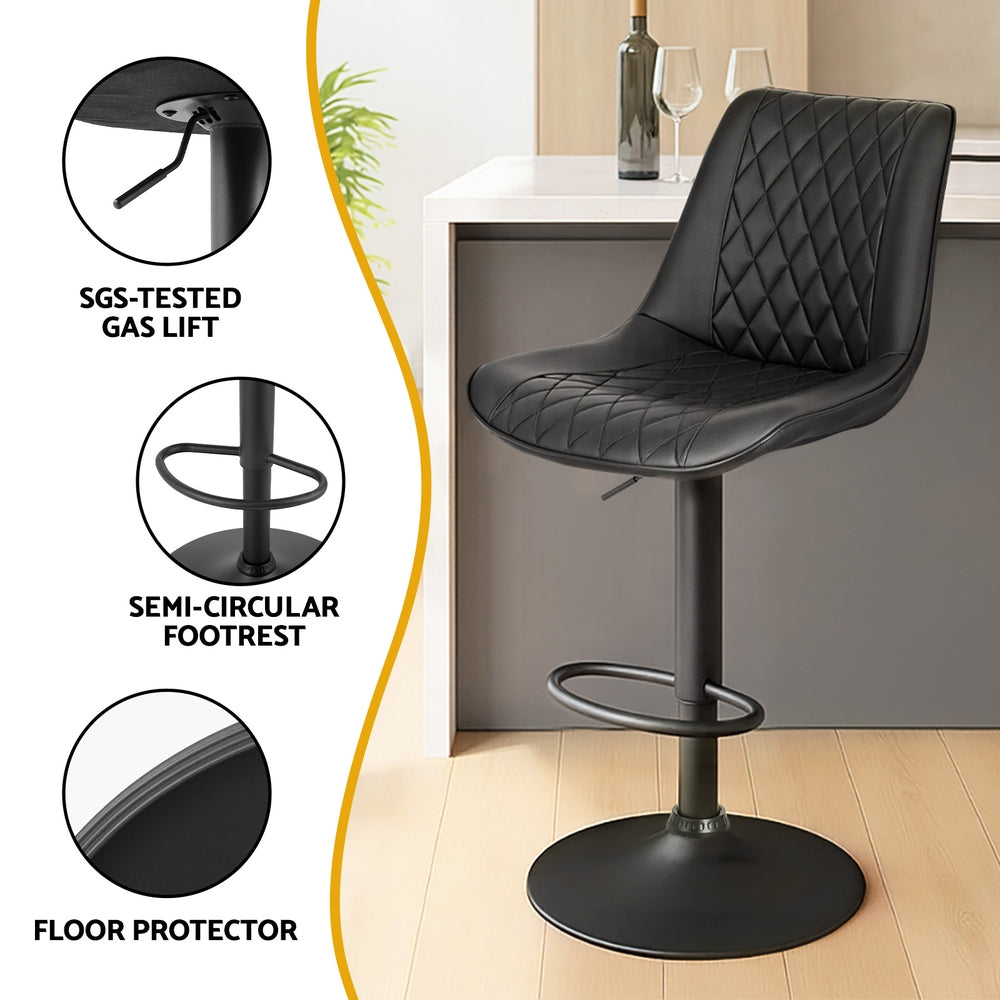 Black bar stool with features highlighted on a light wood floor.