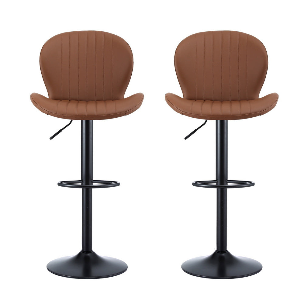 Two brown bar stools with black legs on a white background