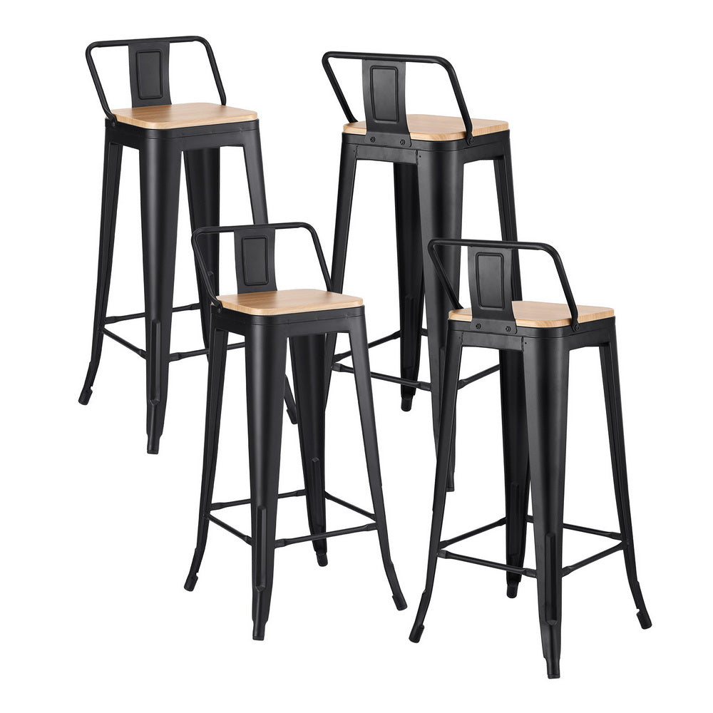 Four black metal bar stools with wooden seats on a white background