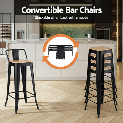 Convertible bar chairs with black metal frames and wooden seats in a kitchen setting.