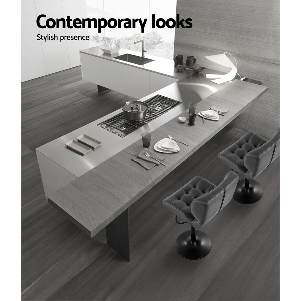 Modern kitchen with gray countertops and stools, featuring the text 'Contemporary looks'.