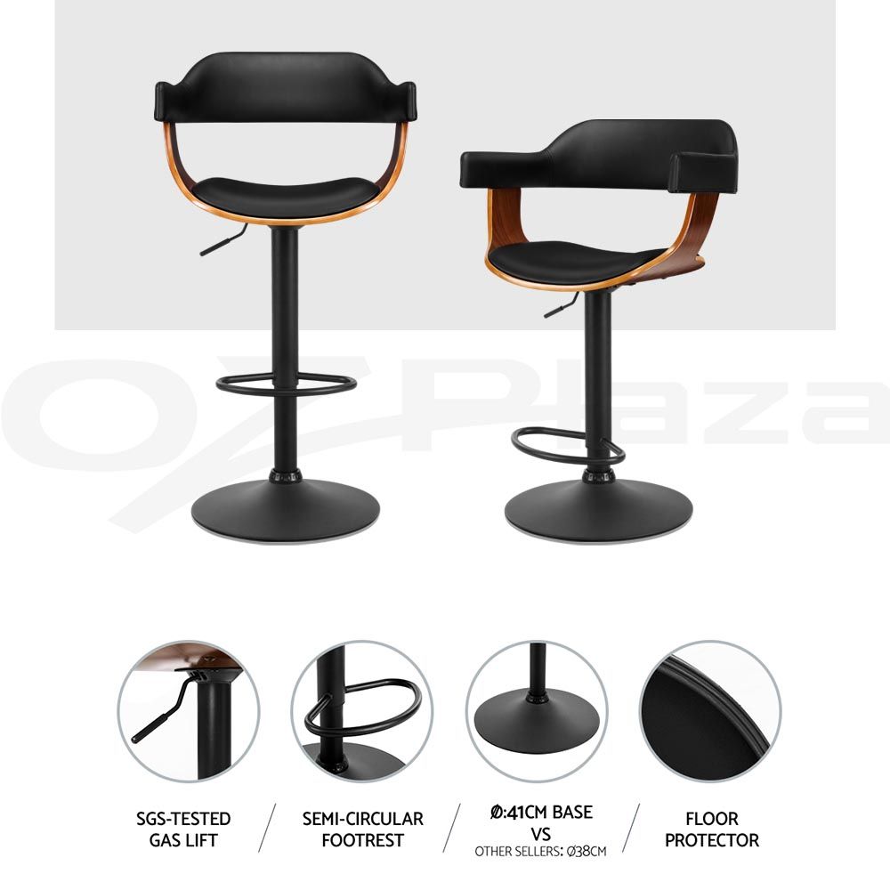 Two modern bar stools shown on a light gray background, with circular inset detail callouts at the bottom highlighting features such as gas lift, semi-circular footrest, round base, and floor protector. The stools have black seats and backs, warm wood-look side supports, and black metal pedestal bases.
