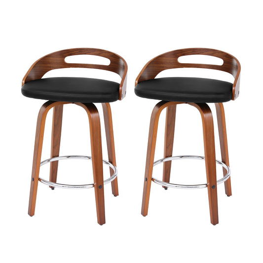 Two wooden bar stools with black seats on a white background