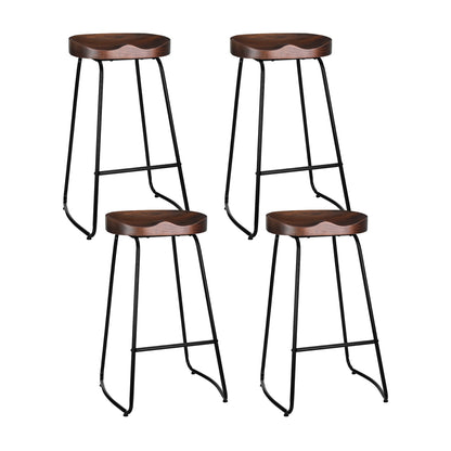 Four bar stools with tractor wooden seats and metal frames on a white background