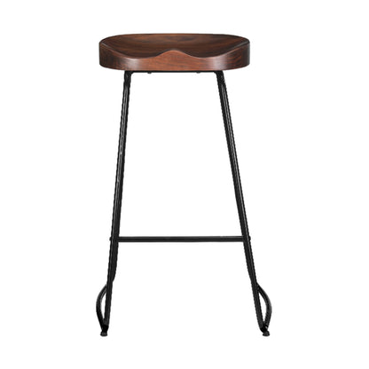 Wooden tractor seat bar stool with black metal legs on a white background