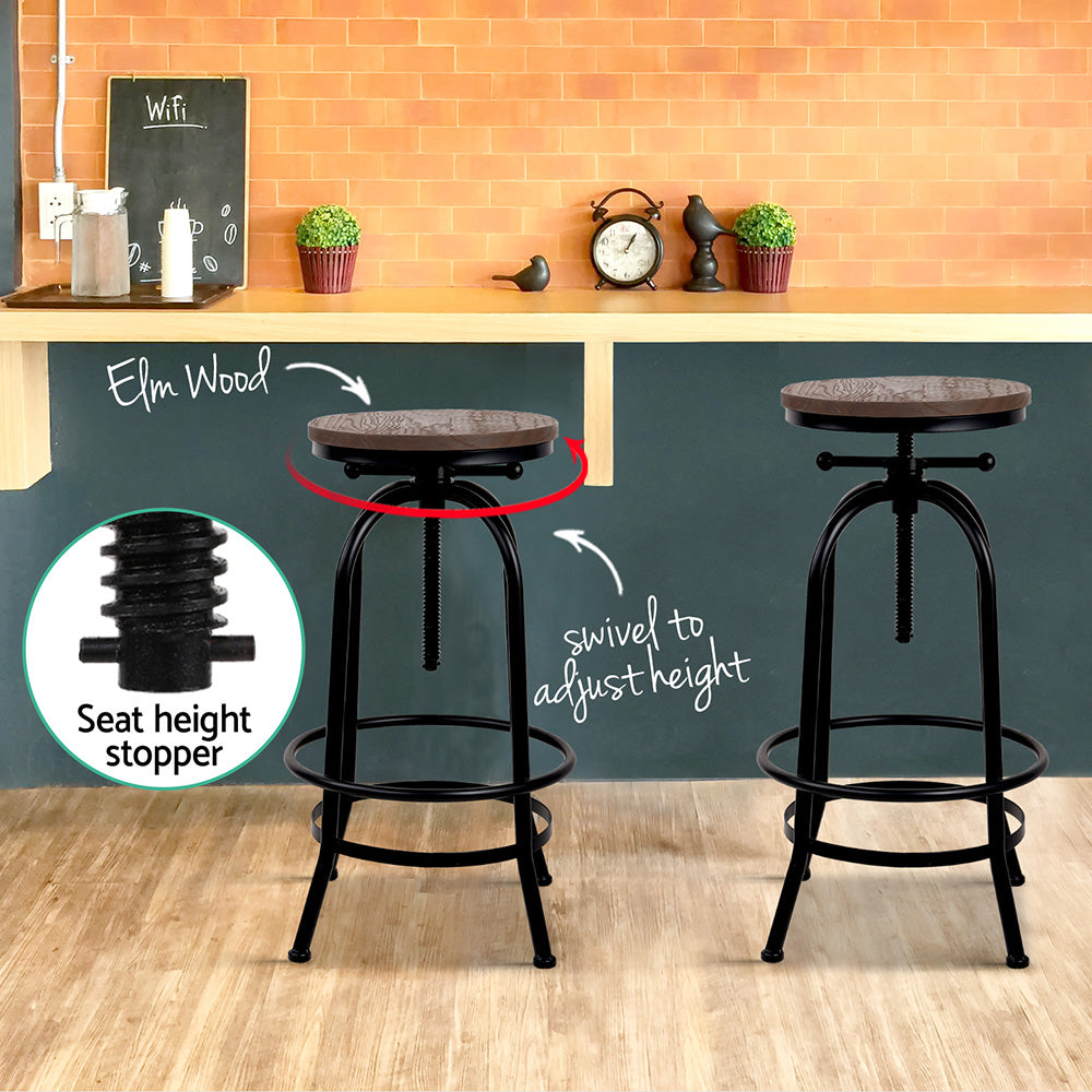 Two adjustable bar stools with a seat height stopper feature, shown in a kitchen setting.