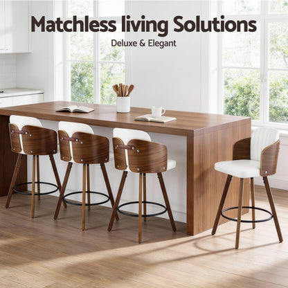 Wooden dining table with chairs in a bright room, featuring 'Matchless Living Solutions' branding.