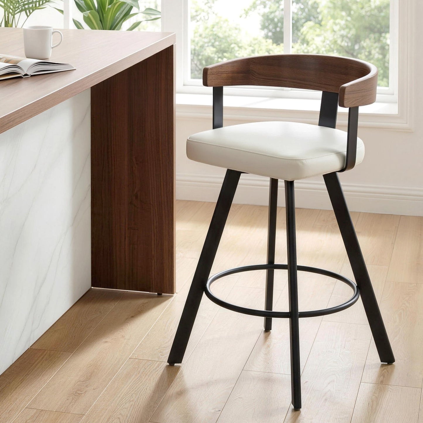 Bar stool with white cushioned seat and wooden backrest in a modern kitchen setting.