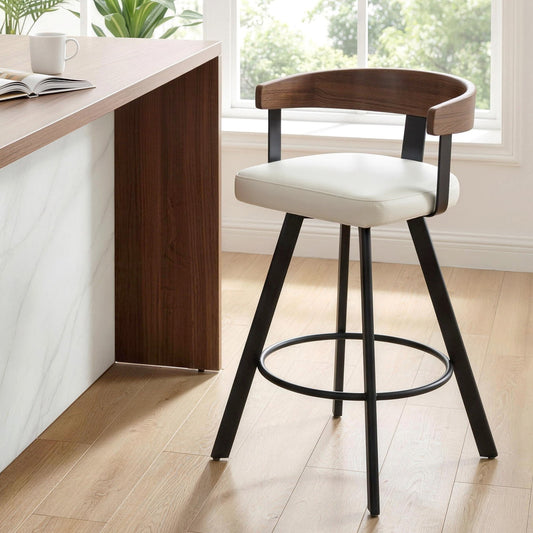 Bar stool with white cushioned seat and wooden backrest in a modern kitchen setting.