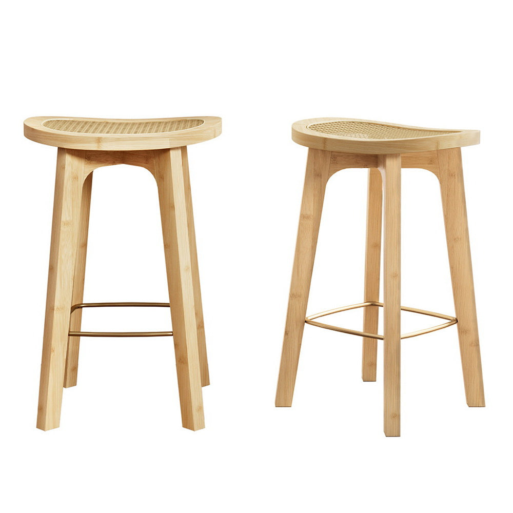 Two wooden bar stools with woven seats on a white background