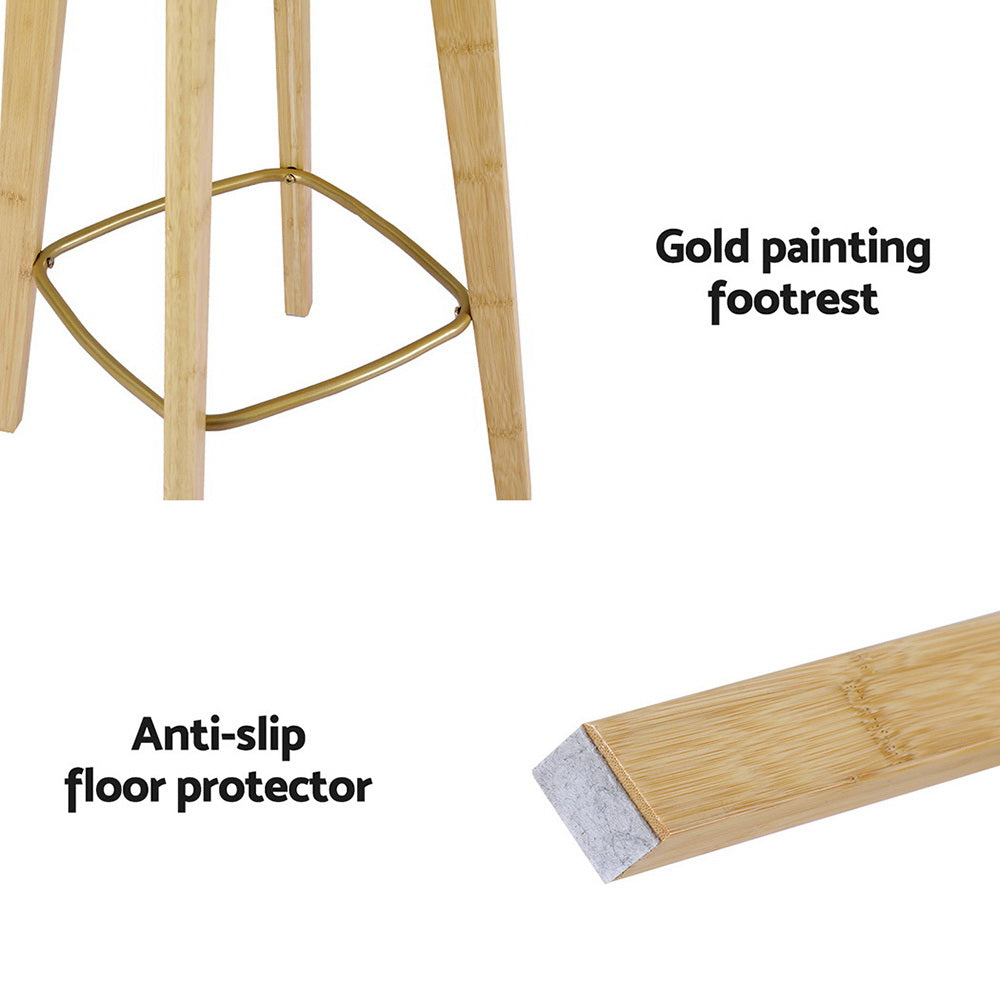 Wooden stool with gold-painted footrest and anti-slip floor protector on a white background