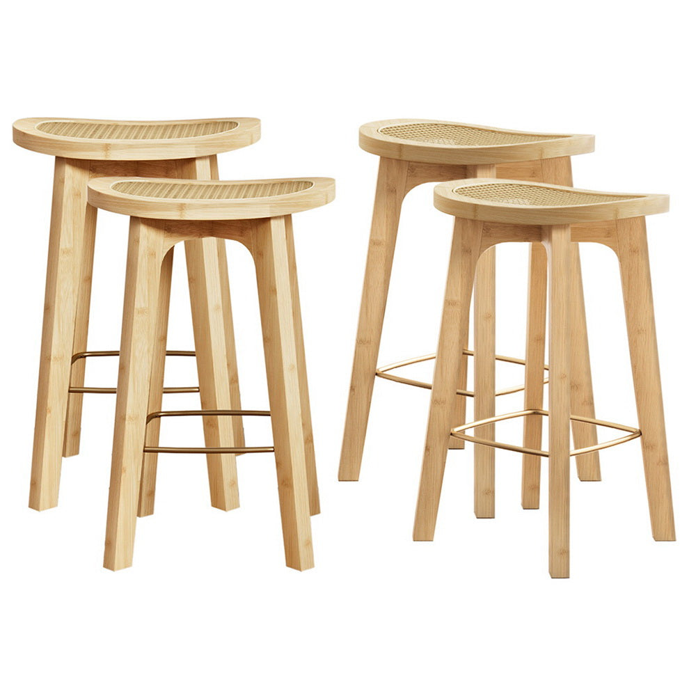 Set of four wooden bar stools with woven seats on a white background