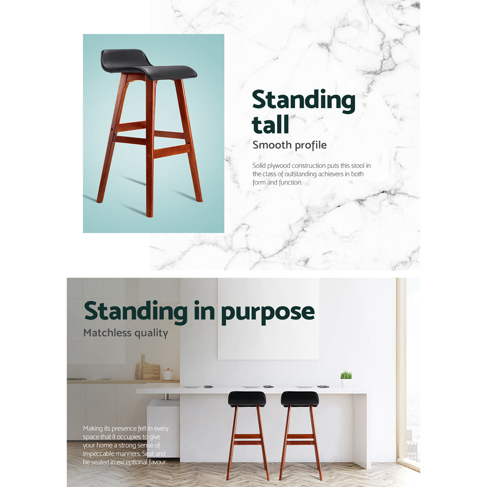 Stool with text 'Standing tall' and 'Standing in purpose' on a marble background