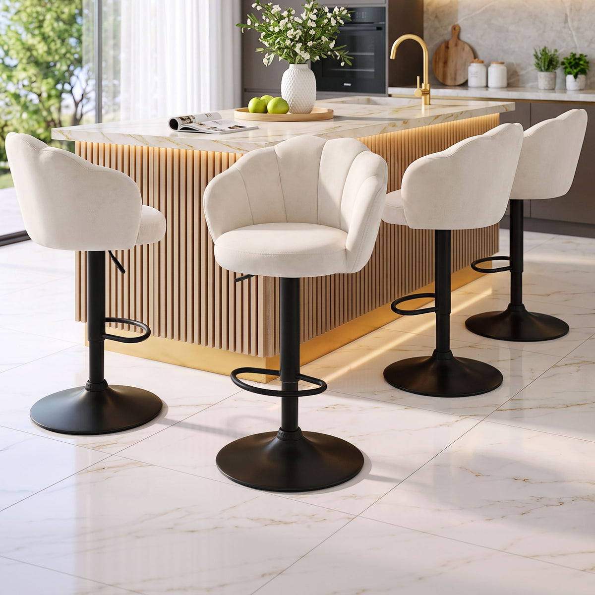 Four Emma ivory velvet swivel bar stools with black pedestal bases arranged around a contemporary kitchen island.
