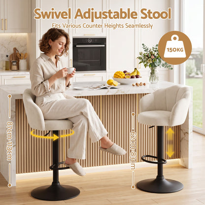 Emma ivory velvet swivel bar stools beside a kitchen island showing adjustable seat height and 150kg weight capacity.