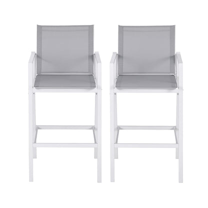 Two white bar stools with gray seats on a white background