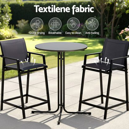 Outdoor patio set with high chairs and a table on a patio, featuring Textilene fabric with icons and text.