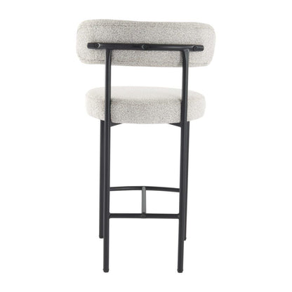 Bar stool with white cushioned seat and backrest on a white background