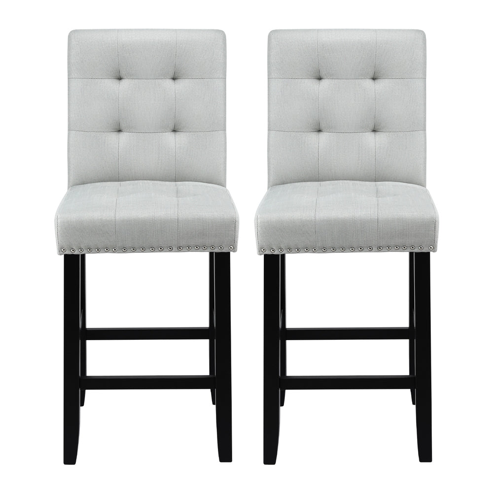 Two gray bar stools with black legs on a white background
