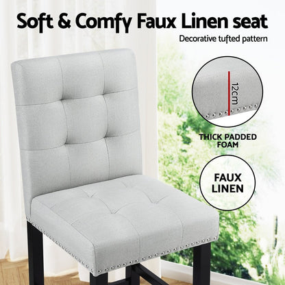 Grey upholstered chair with text highlighting features like 'Soft & Comfy Faux Linen seat' and 'Decorative tufted pattern'.