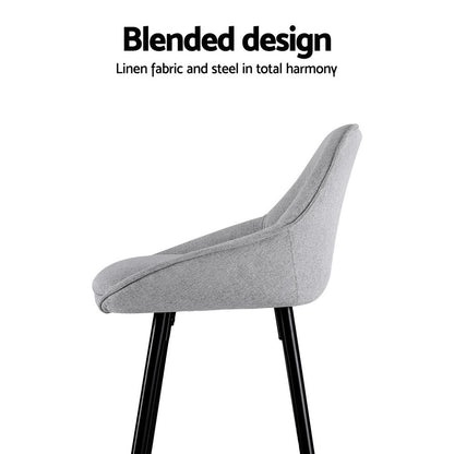 Gray chair with black legs on a white background, featuring text about blended design.