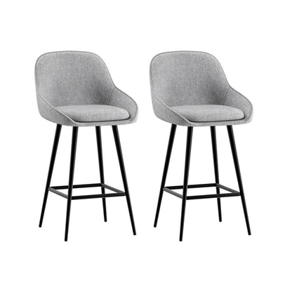 Two gray bar stools with black legs on a white background