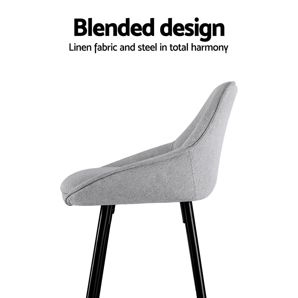 Gray chair with black legs on a white background, featuring text about blended design.