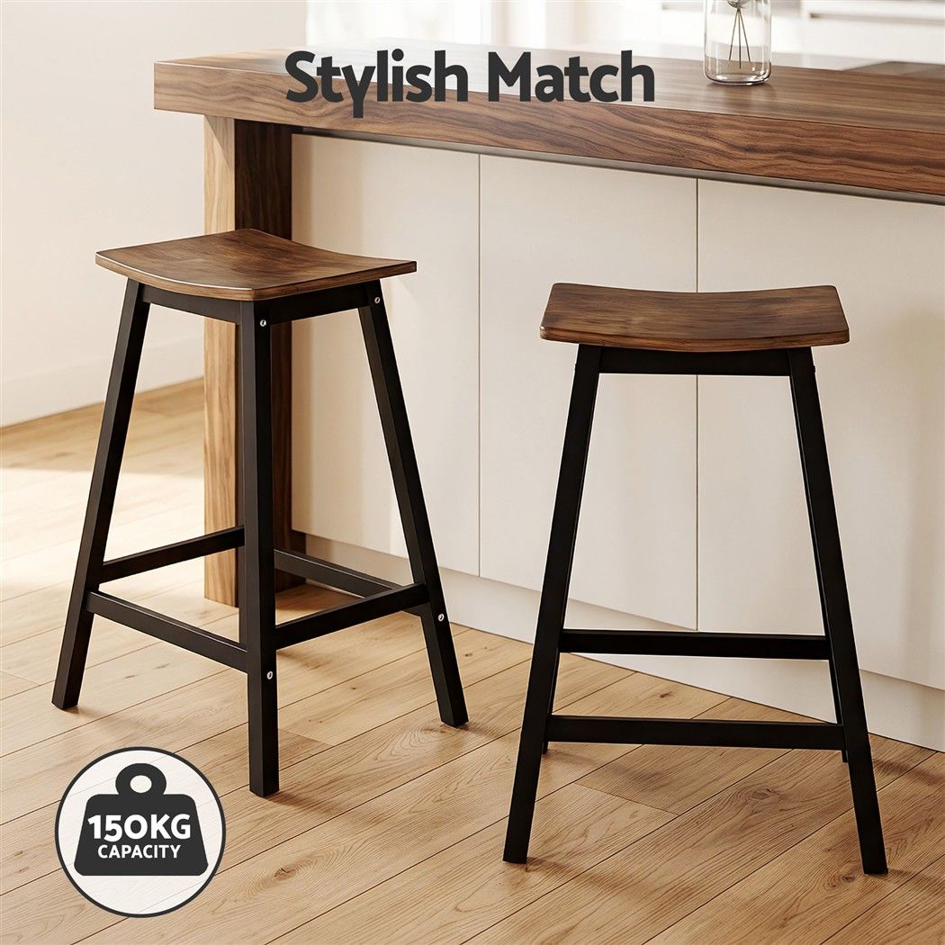 Set of Brooks rustic brown 65cm timber bar stools with 150kg weight capacity in a modern kitchen setting