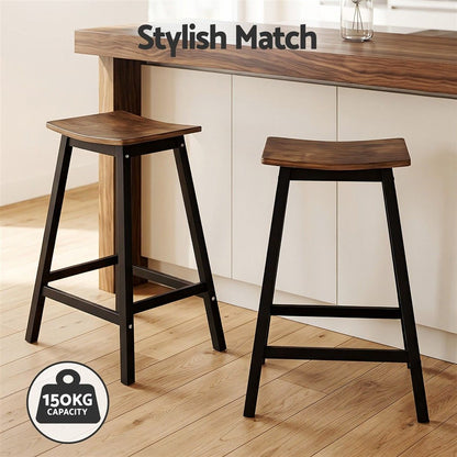 Set of Brooks rustic brown 65cm timber bar stools with 150kg weight capacity in a modern kitchen setting
