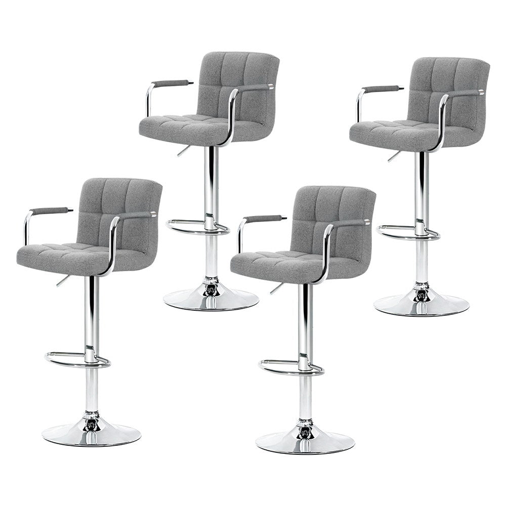 Four gray bar stools with chrome bases on a white background