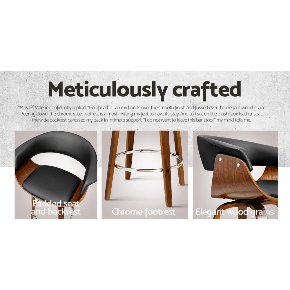 Jasper black PU leather bar stool showing padded seat and backrest, chrome footrest and timber frame